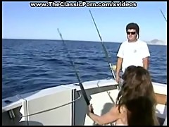Hot girls get nude and fuck on a boat